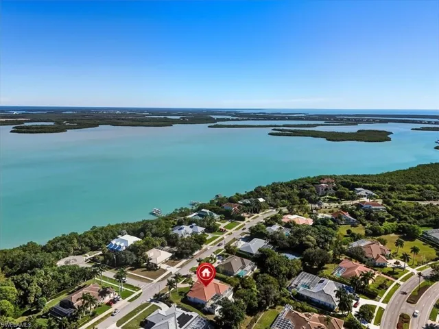 Barfield Bay - Aerial view of property and surrounding area with nearby suburban area and a large body of water