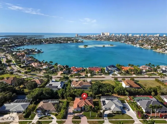 Roberts Bay / Gulf  and Downtown Aerial view of residential area with a nearby body of water