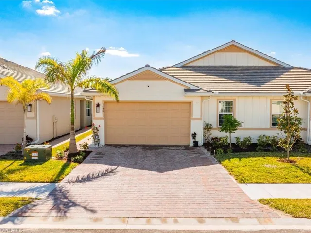 Ranch-style home featuring a garage