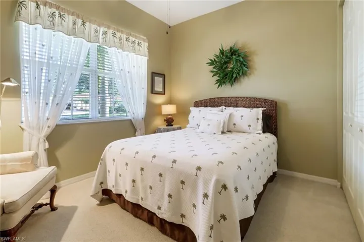 Bedroom featuring carpet floors and a closet