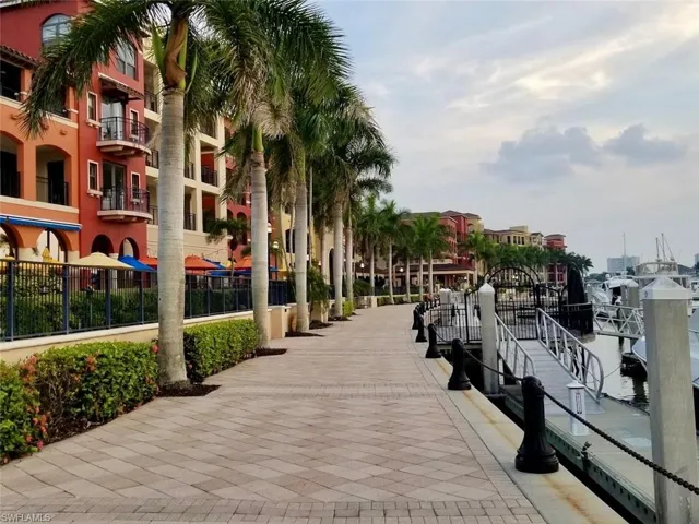View of community featuring fence