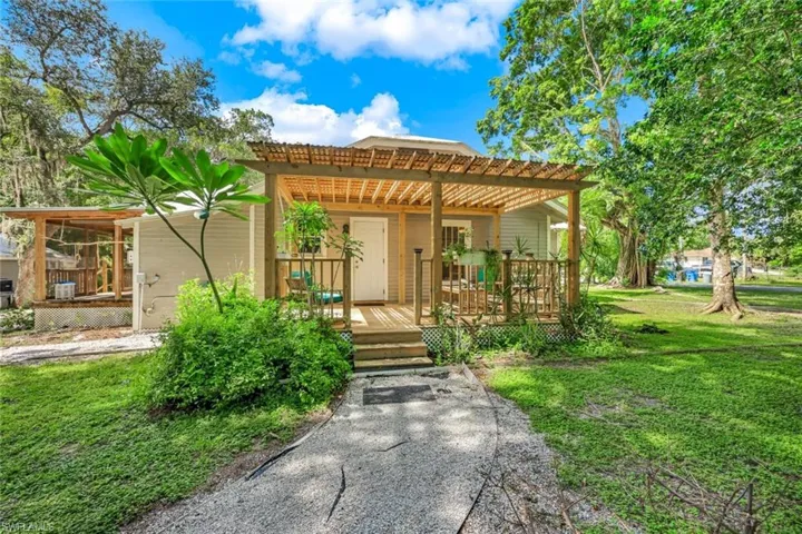 Main home boasts two stunning outdoor spaces for dining or relaxing.
