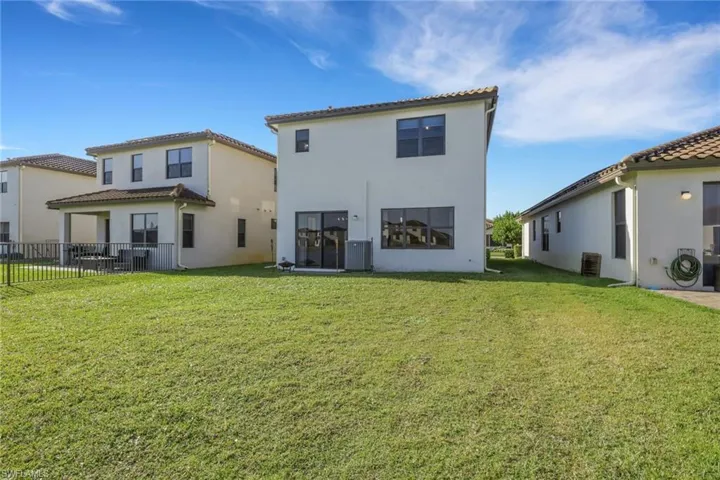 Large backyard with a gorgeous lake view! Plenty of room to add a pool!