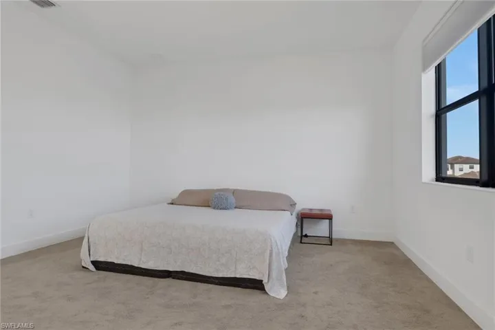 Large Master Suite with tons of natural lighting, two closets, and master bath with dual sinks and large shower