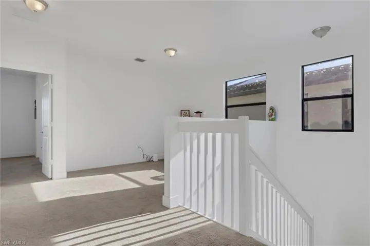 Spacious Loft/Den/Bonus Area upstairs!! Great space for an office, den/study, playroom, or even a 4th bedroom!