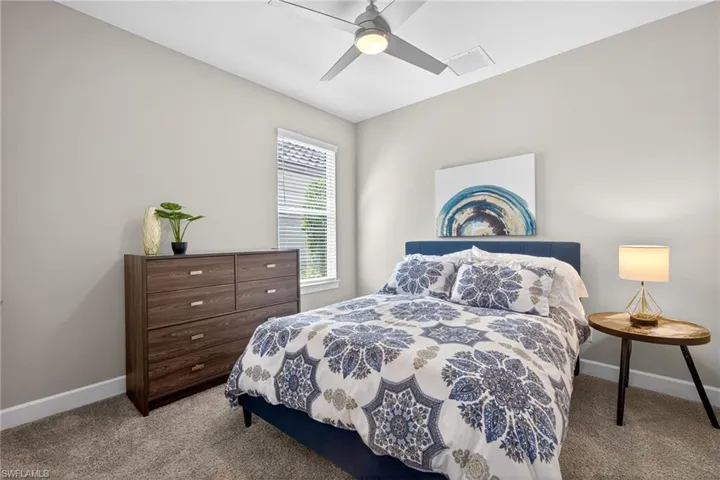 Bedroom 3 featuring carpet and a ceiling fan
