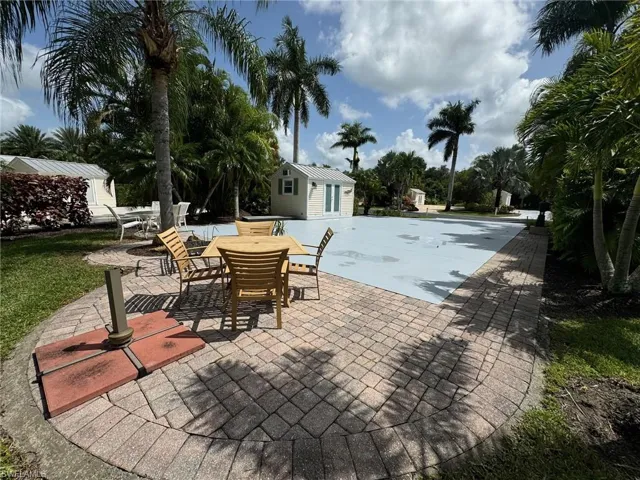 View of patio / terrace with an outbuilding
