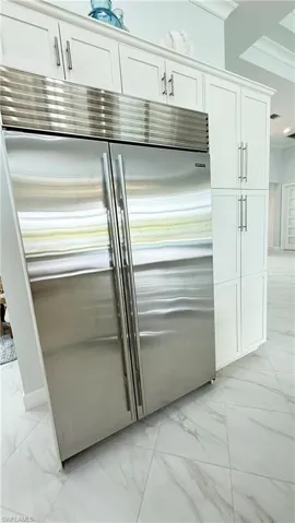 The large sub zero refrigerator and freezer and viking appliances are upgrades from the developer's package.