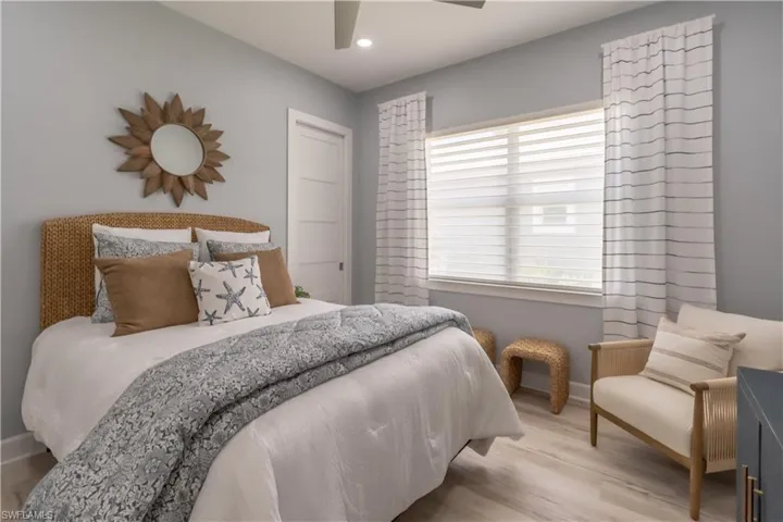 Guest bedroom suite has luxury vinyl plank flooring, walk in closet and adjoining bath.
