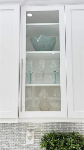 glass display cabinets in kitchen add interest