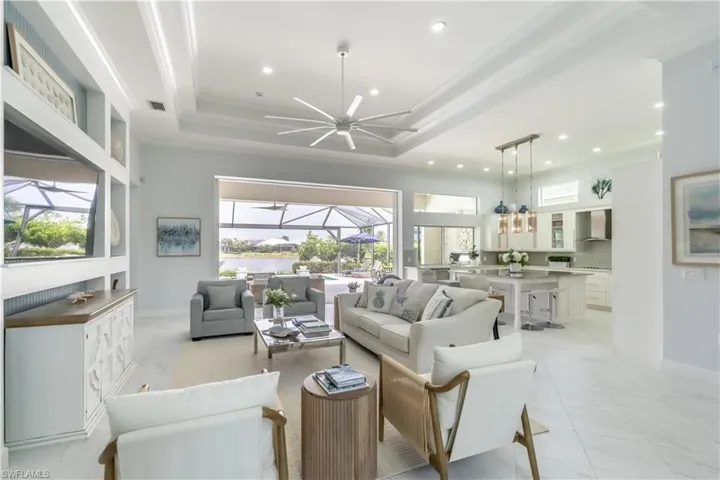 This home definitely brings the outside in. The huge sliding doors pocket seamlessly all the way into the walls, creating true indoor outdoor Florida-style living!