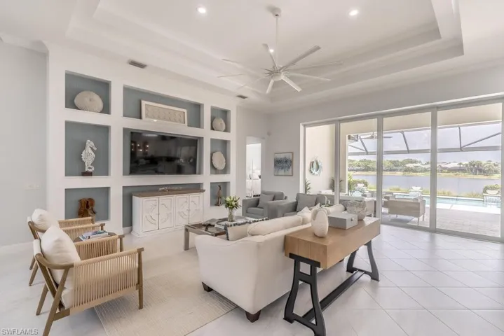 Custom built wall unit anchors the TV and adds interest to the room through your personal art and accessories.