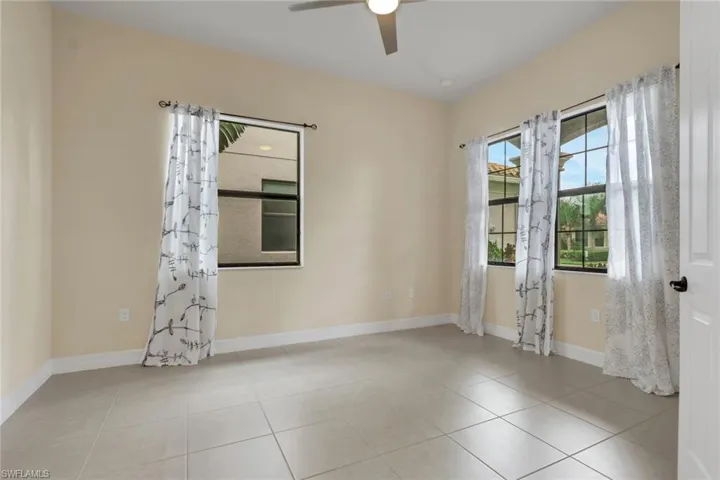 Located in the front of the home to the right of the entry; 11.6 x 14.4 with 10 ft ceilings