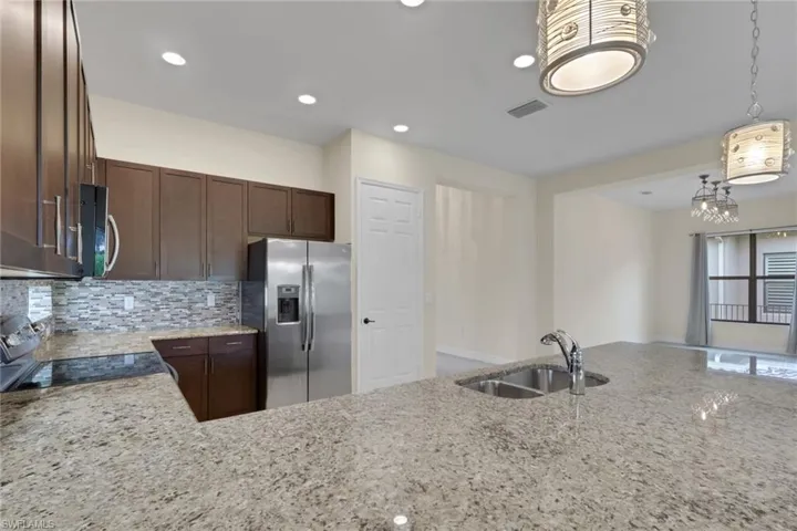Granite countertops; formal dining area located across from the kitchen