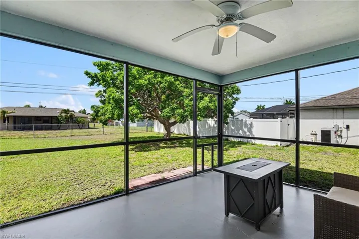 overlooking the huge backyard with mature trees