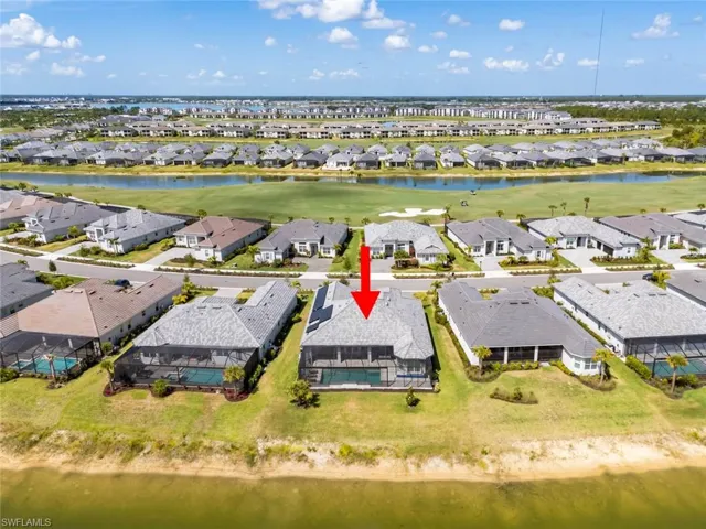 Bird's eye view featuring a water view, a residential view, and golf course view