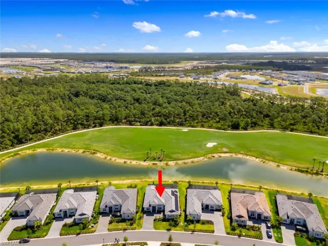 Bird's eye view featuring a water view, golf course view, and a residential view