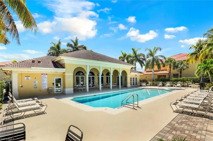 View of swimming pool with a patio area