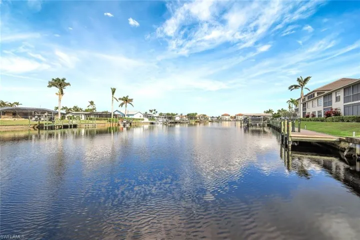 Water view featuring a dock