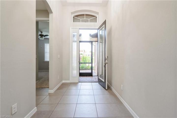 Foyer with tile floors