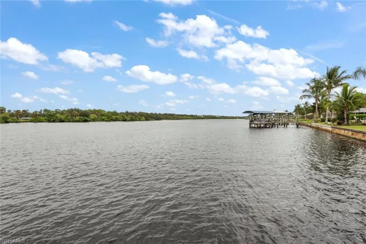 Water view with a boat dock