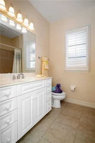 Second Southern Lit Bathroom with Plantation Shutters Combo Tub/Shower