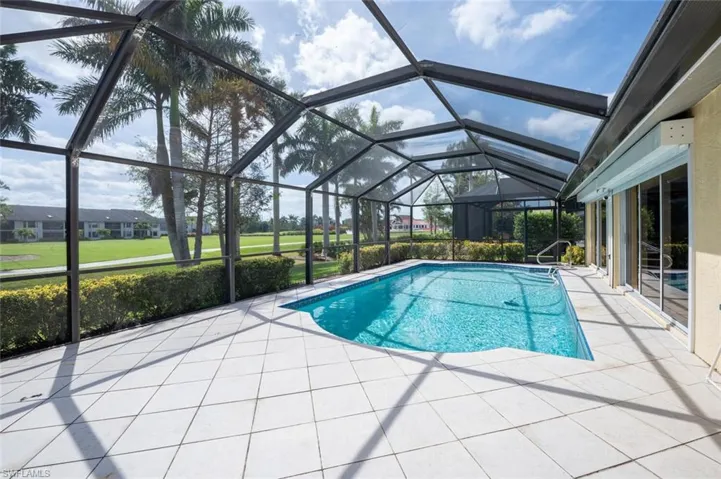Pool featuring a lanai and a patio