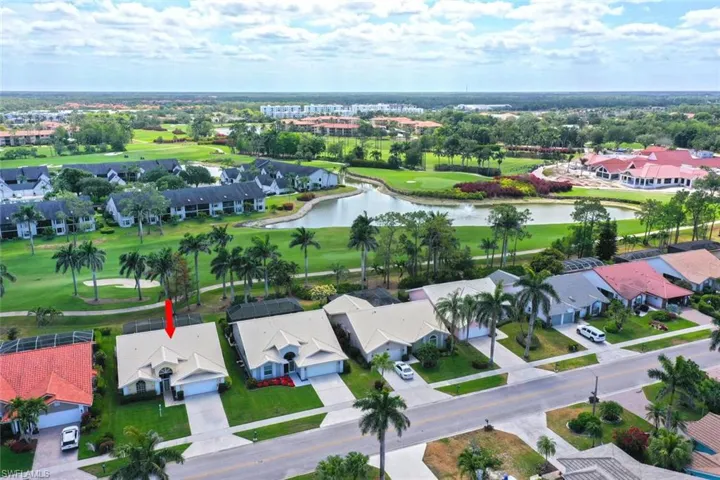 Birds eye view of property with a residential view, golf course view, and a water view