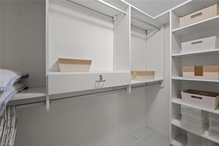 Owner's Walk-in Closet with California Closets system