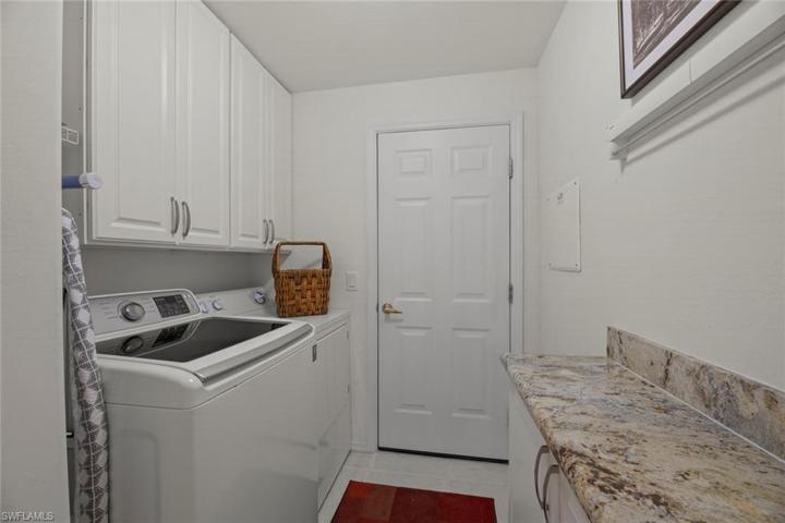 Laundry with add'l storage cabinet
