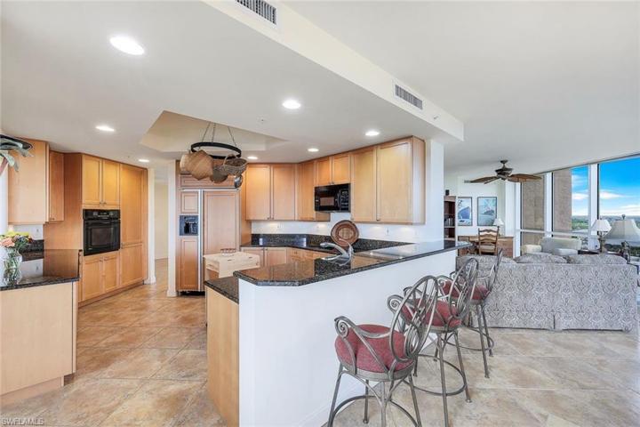Easily update these classic shaker style cabinets with paint.  Quartz countertops can be the finishing touch!