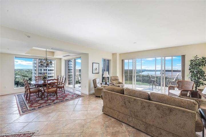View of dining and living, all with sliding doors leading to spectacular views!