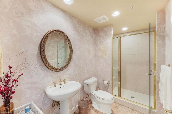 Additional guest bathroom with a walk in shower.