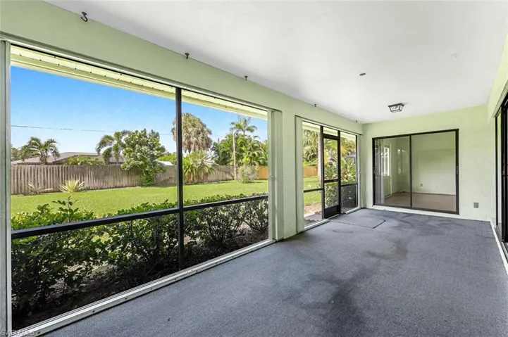 Unfurnished sunroom with plenty of natural light