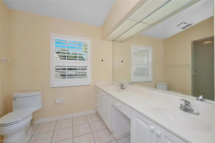 Primary Bathroom walk in shower & double vanity