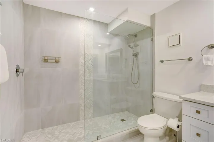Stunning bathroom remodel, custom tile, glass walk in shower.
