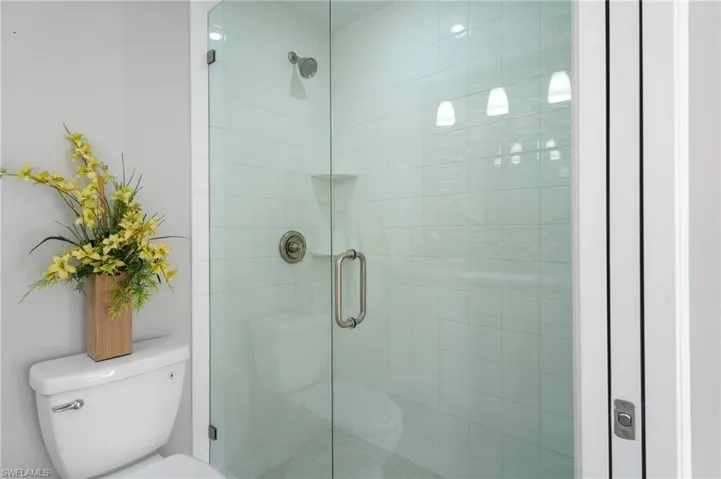 Primary Bathroom featuring a stall shower.