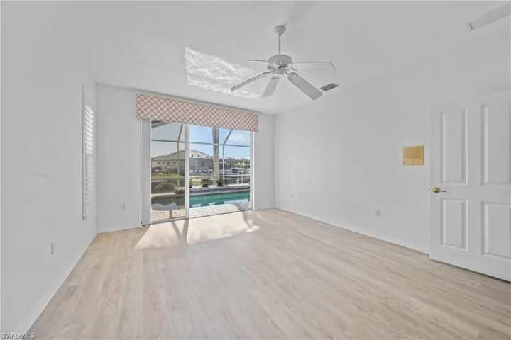 Spare room featuring light hardwood / wood-style flooring and ceiling fan