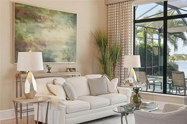 Living area featuring baseboards