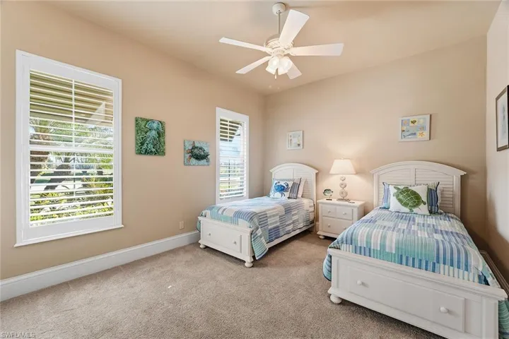 Bedroom featuring carpet floors and a ceiling fan