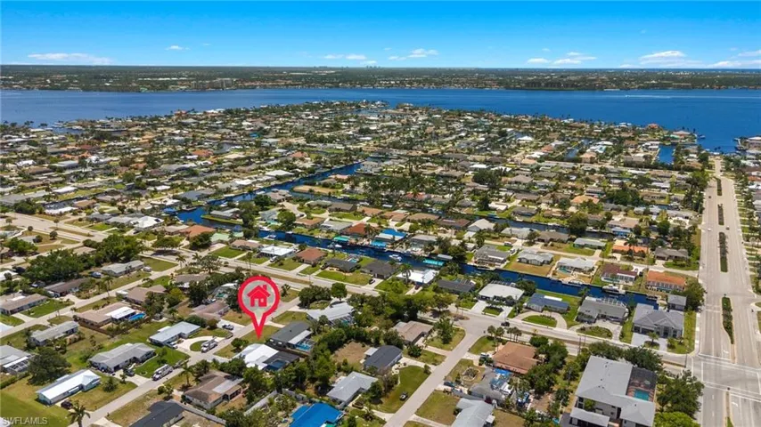 Amazing location in the Yacht Club neighborhood just minutes to both downtown Cape Coral and the Yacht Club beach and Boathouse waterfront Restaurant.