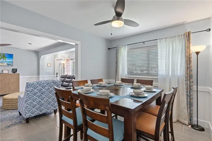 The dining room space offers the flexibility of a more formal dining environment feel while also being open to the living room space.