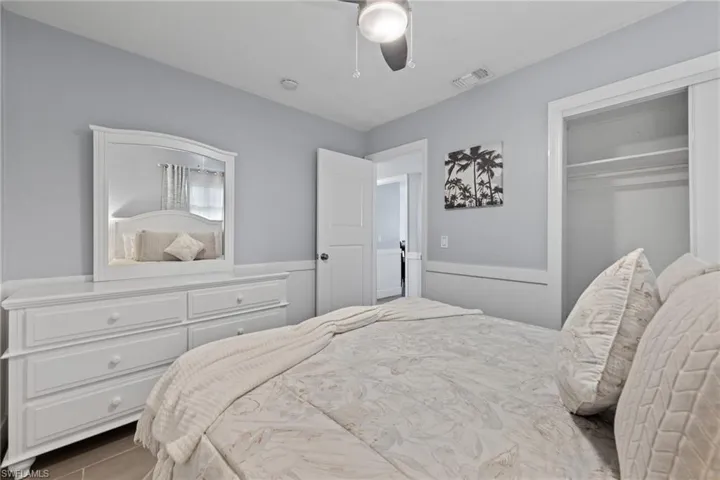 Guest bedroom 2 with queen bed.
