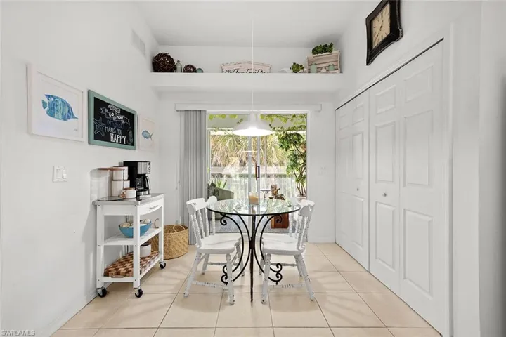 Dining room featuring light tile patterned floors