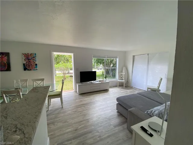 Living area featuring light wood-style flooring