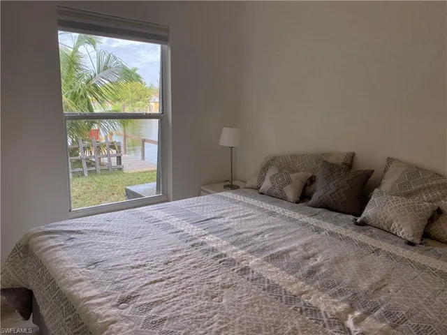 Bedroom featuring a water view