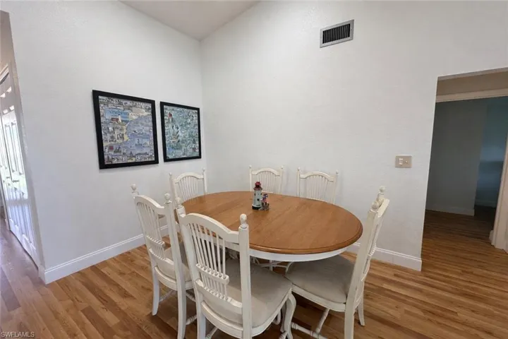 Dining space featuring light wood finished floors