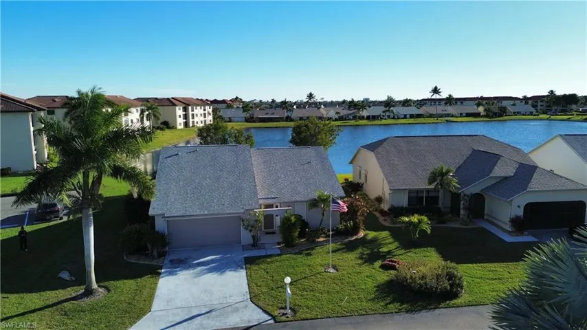 Aerial view of residential area with a large body of water