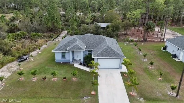 Aerial view of property and surrounding area
