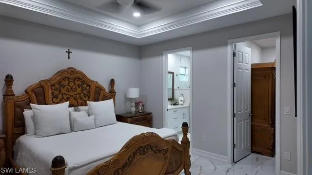Bedroom featuring connected bathroom, crown molding, ceiling fan, light marble finish flooring, and recessed lighting